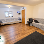 Reception room with wood flooring at Tynedale Road, Tyseley