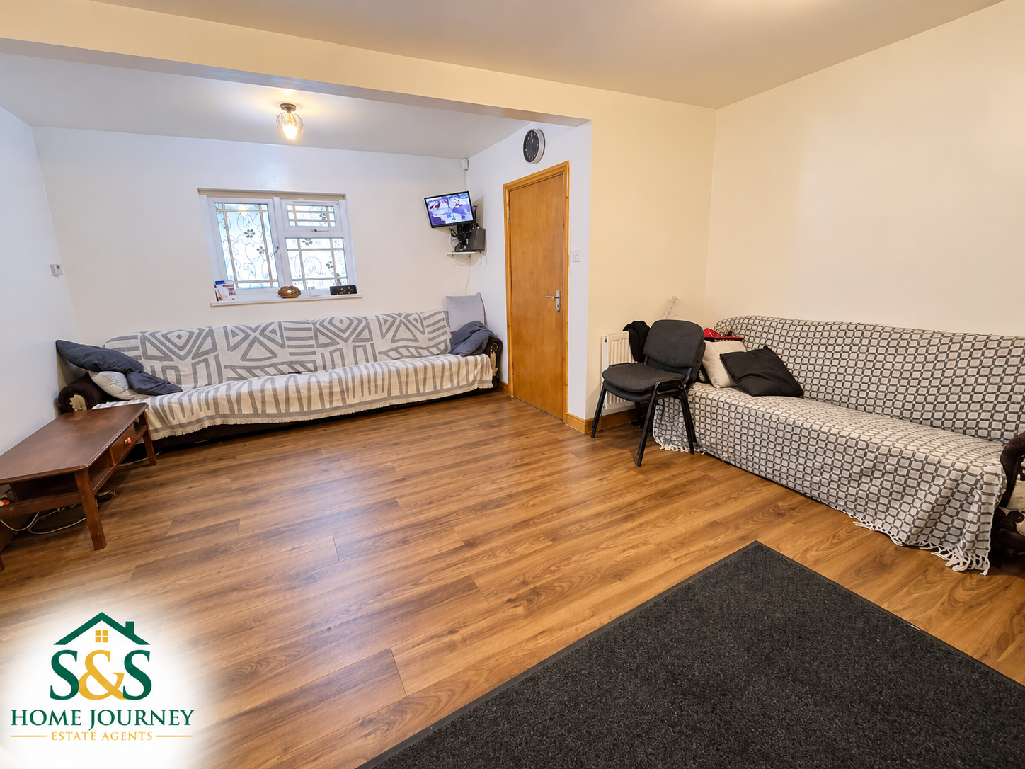Reception room with wood flooring at Tynedale Road, Tyseley