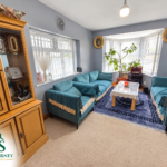 Reception room with seating and bay window at Tynedale Road, Tyseley