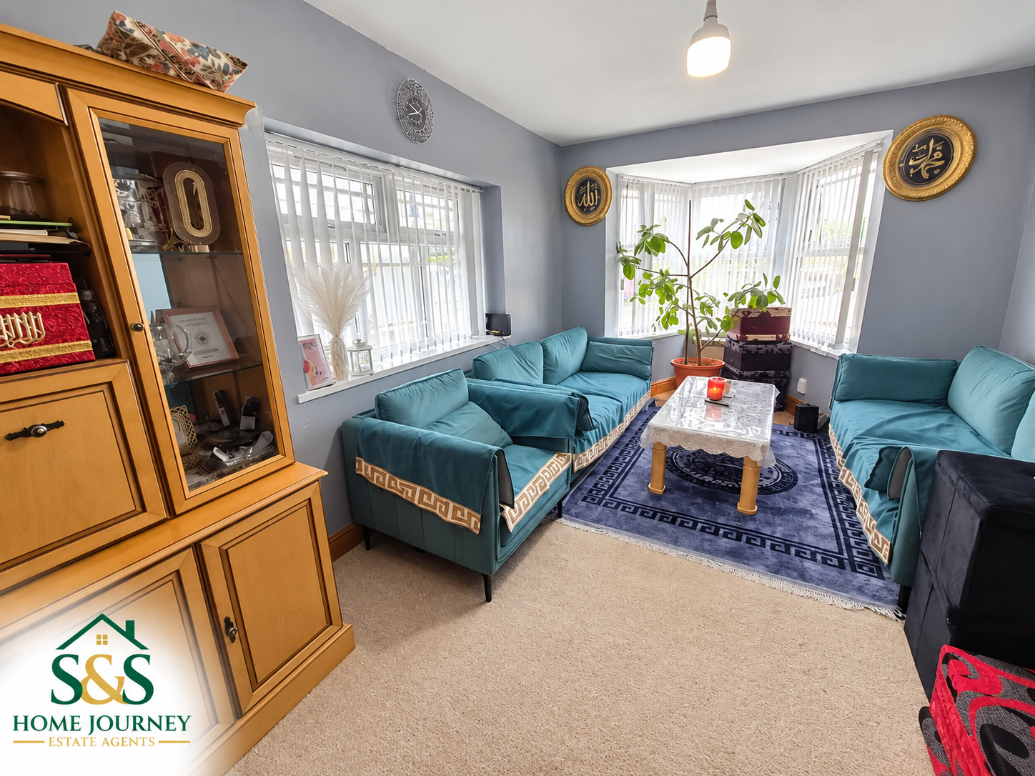 Reception room with seating and bay window at Tynedale Road, Tyseley