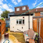 Enclosed paved rear outdoor area and rear extension at the Tyseley property