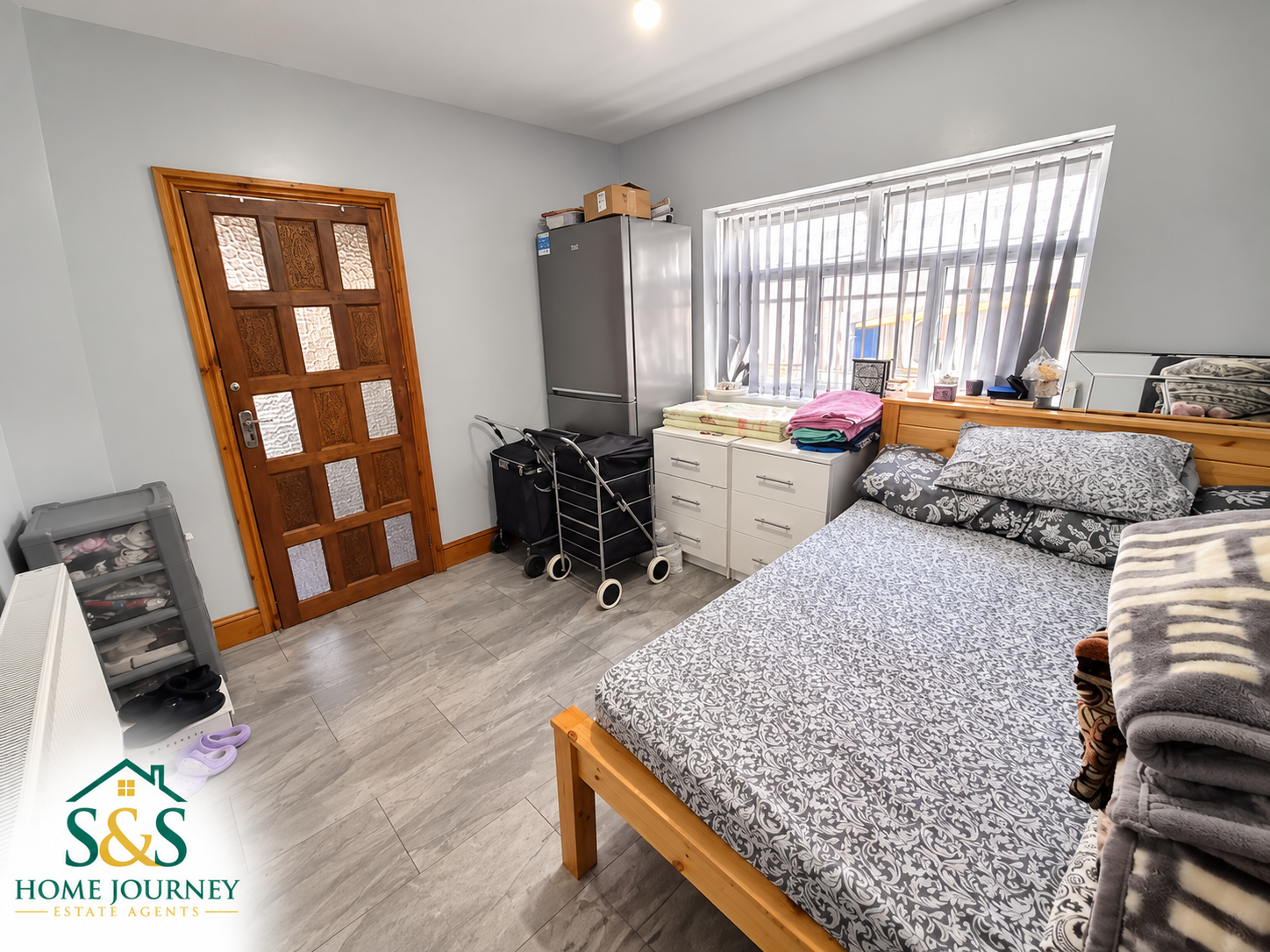Bedroom with a double bed at the eight-bedroom Tyseley home