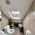 Upper-floor WC with roof window at the Tyseley property